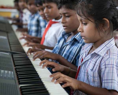 Teaching Music to the underprivileged children