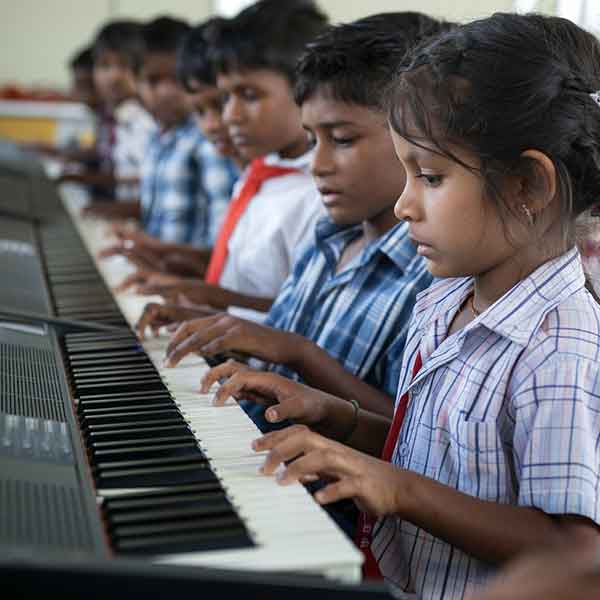 Teaching Music to the underprivileged children